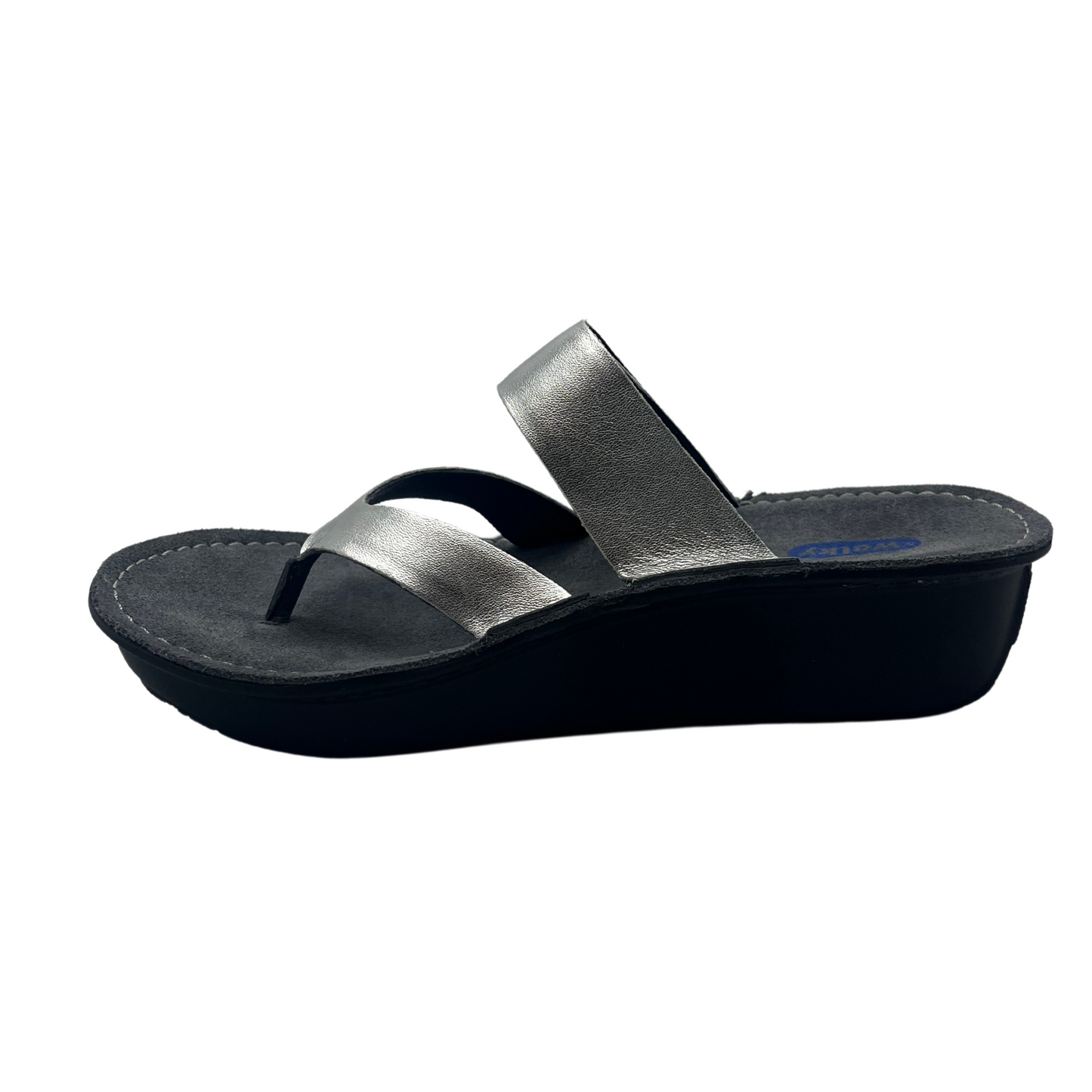 Left facing view of a metallic silver sandal with a wedge heel and an adjustable strap