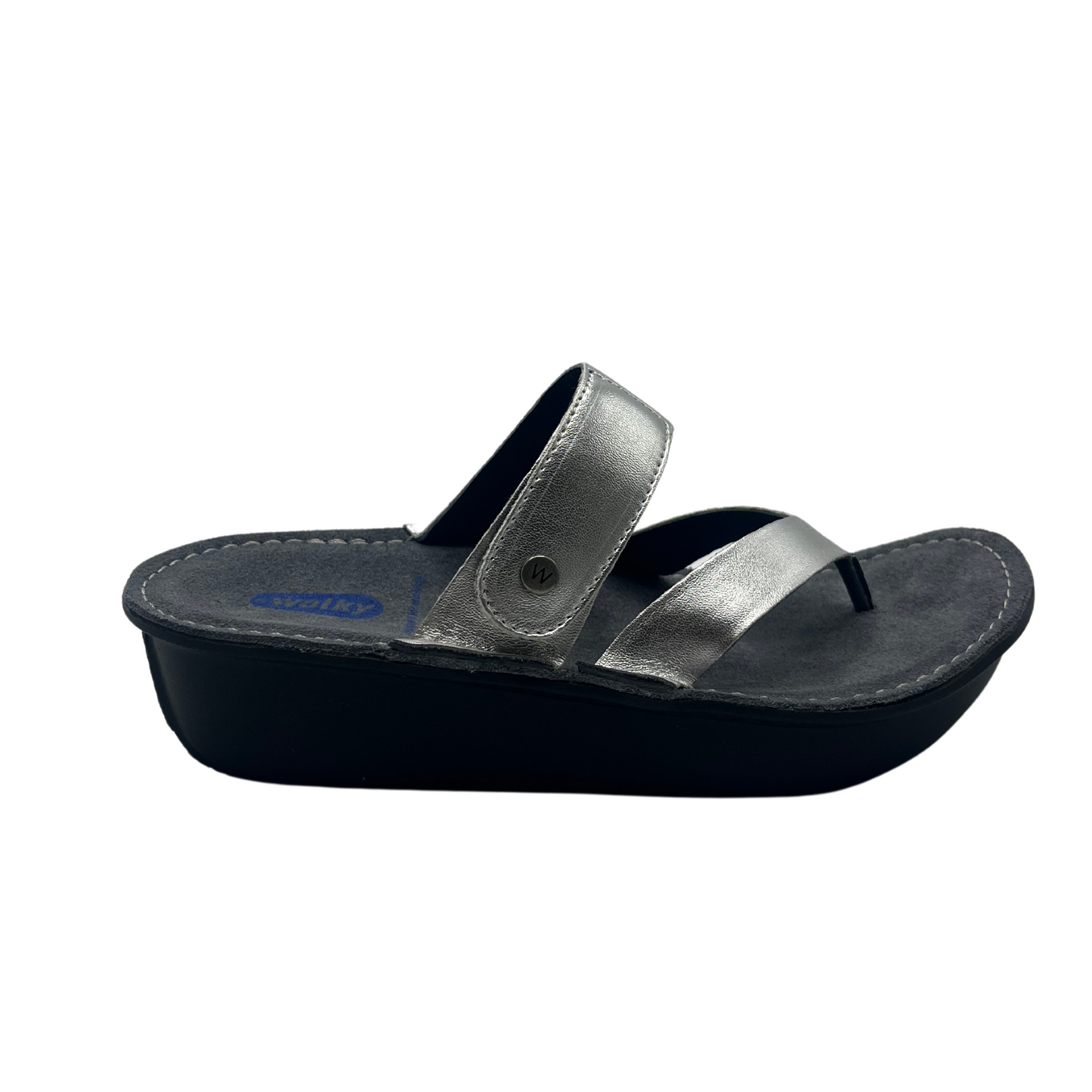 Right facing view of a metallic silver sandal with a wedge heel and an adjustable strap
