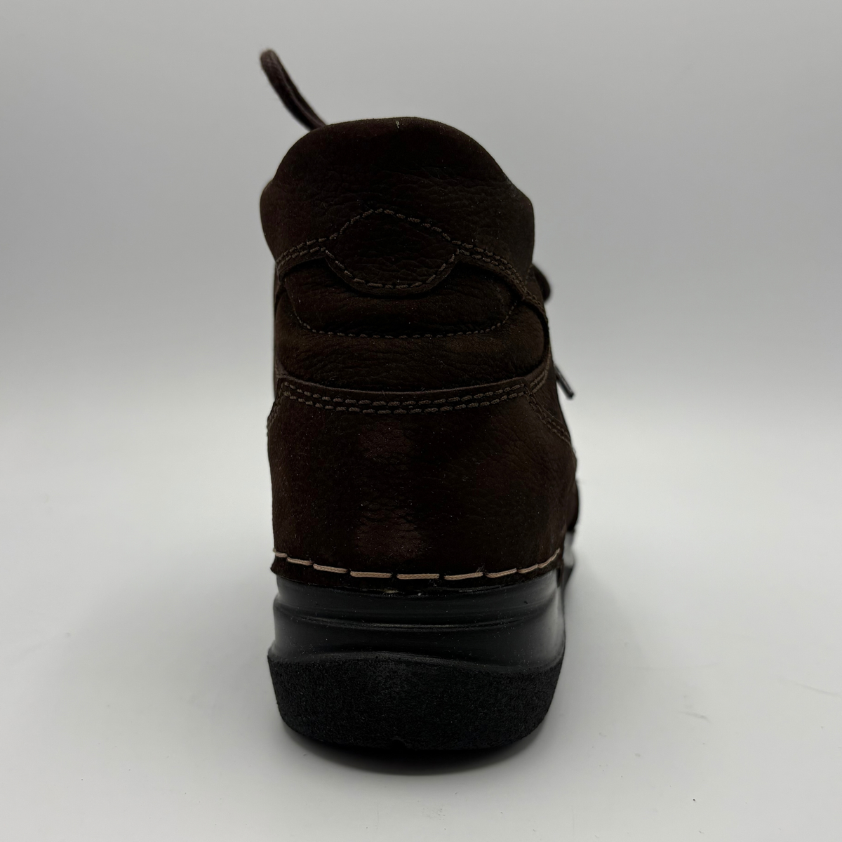 Back view of a brown ankle boot with matching laces