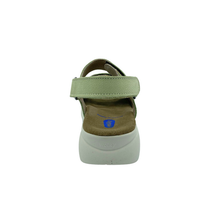 Rear view of a light green leather sandal with a contrasting white sole