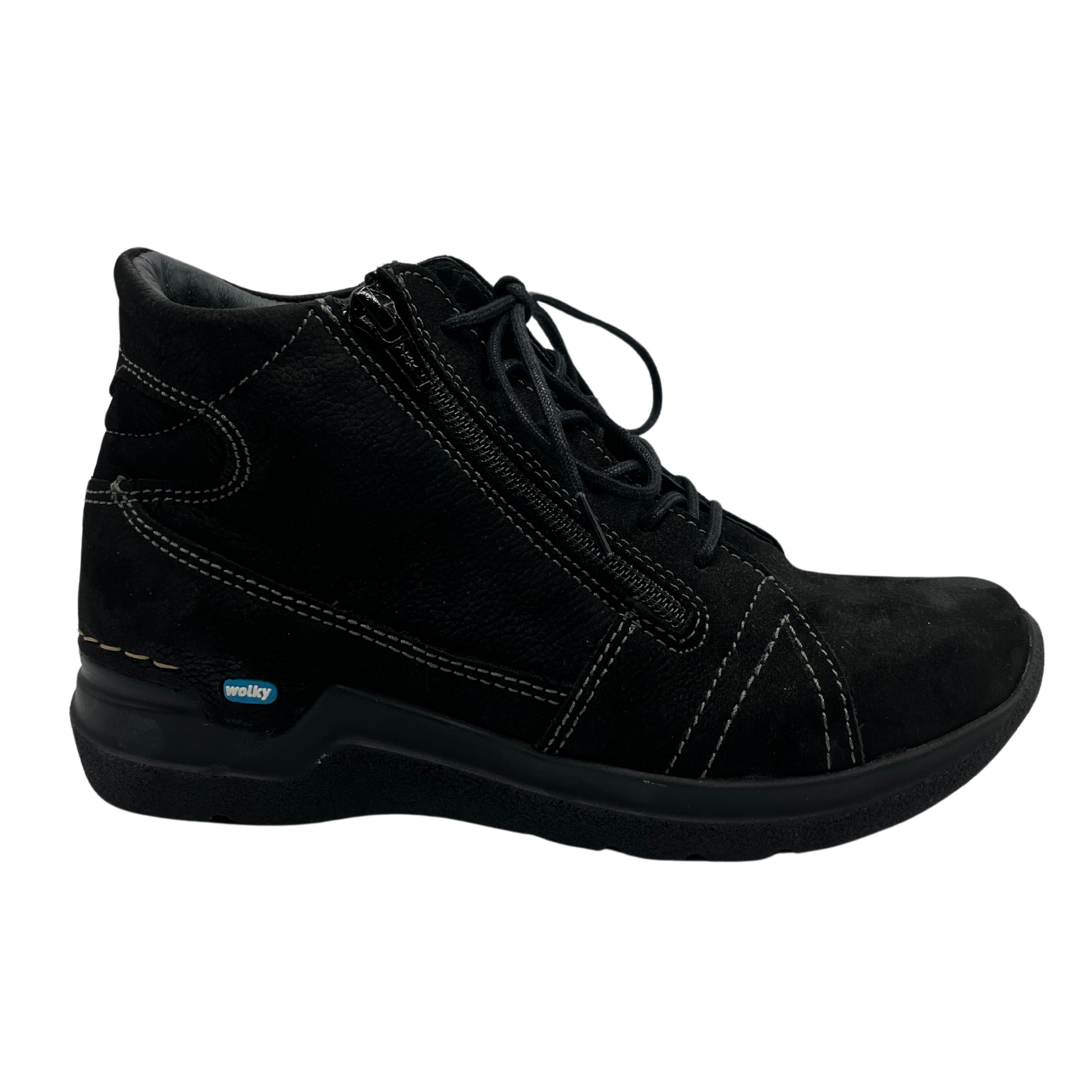 Right facing view of black suede short boot with matching laces, side zipper closure and black outsole
