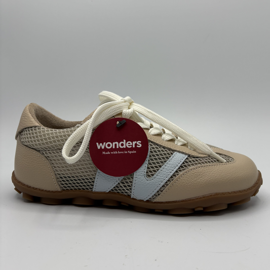 Beige sneaker with a 'wonders' tag on a gray background