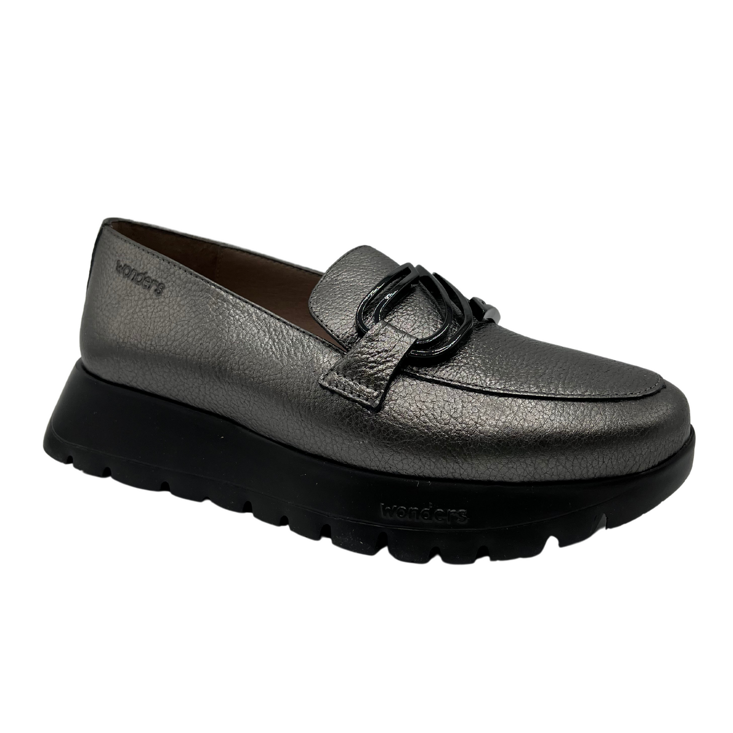 45 degree angled view of textured leather loafer in grey. A black thick platform sole and black embellishment on the upper 