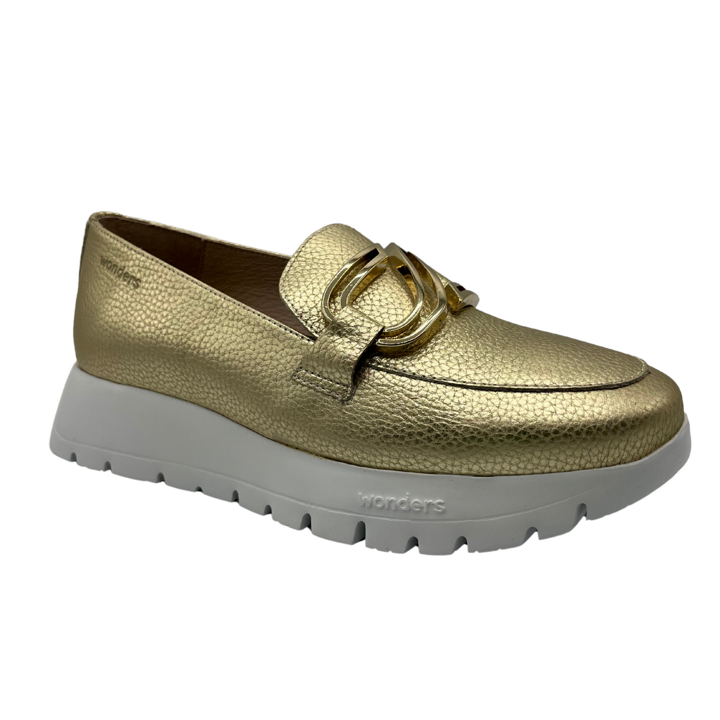 Angled view of gold leather loafers with lightweight white platform sole and gold detail on upper.