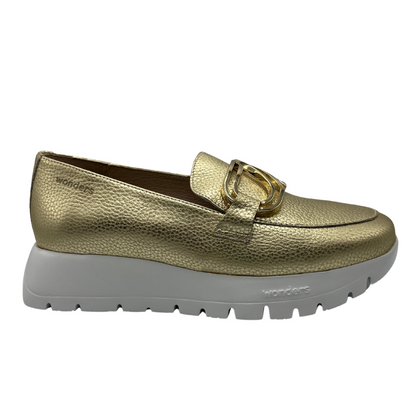 Right facing view of gold leather loafers with lightweight white platform sole and gold detail on upper.