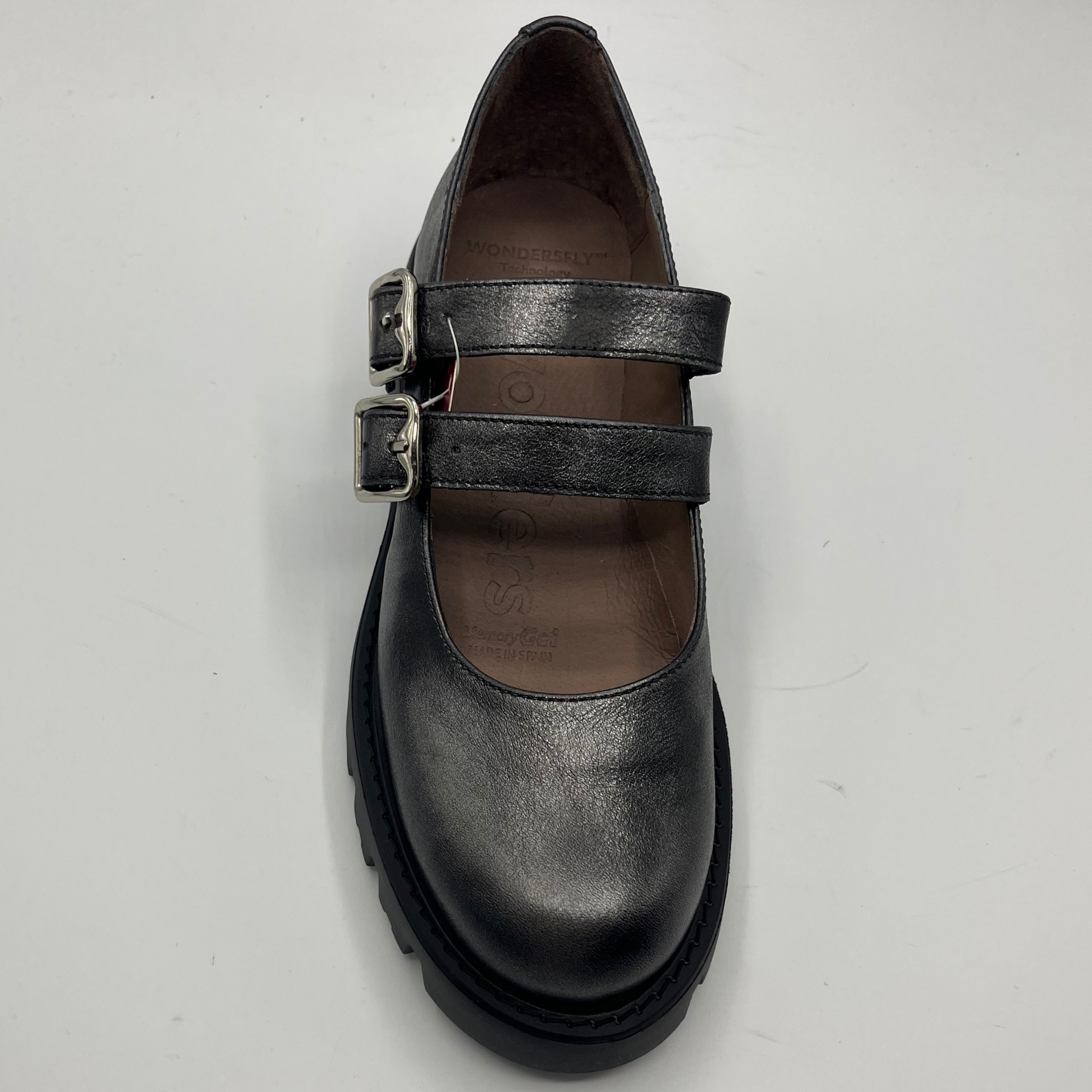 silver shoe with a strap on a white background