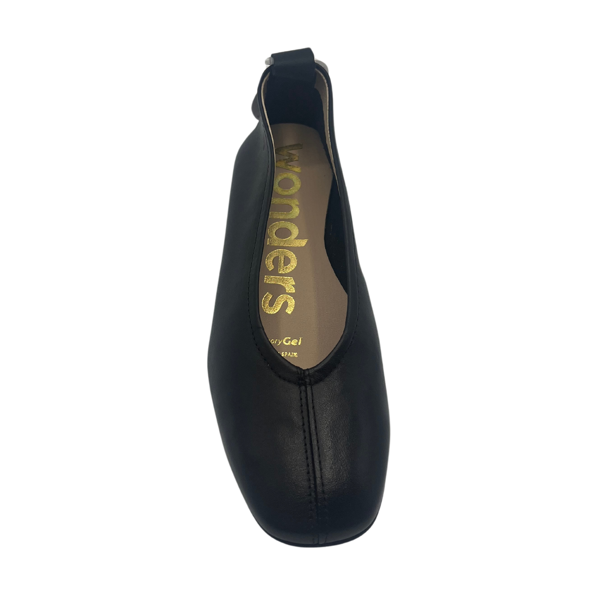 Top view of black leather ballet flat with rounded toe and pull tab on heel