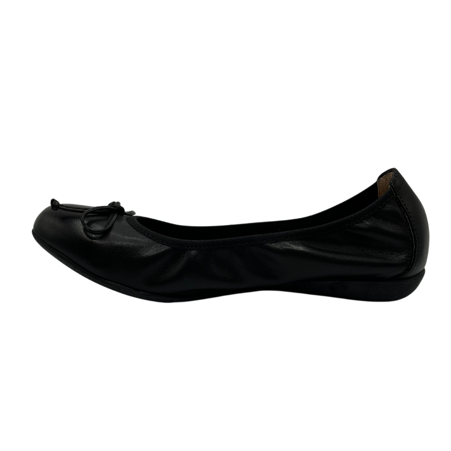 Left facing view of black leather ballet flat with bow detail and subtle heel