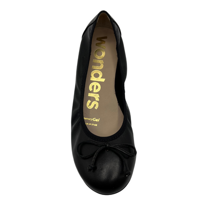 Top view of black leather ballet flat with bow detail and subtle heel