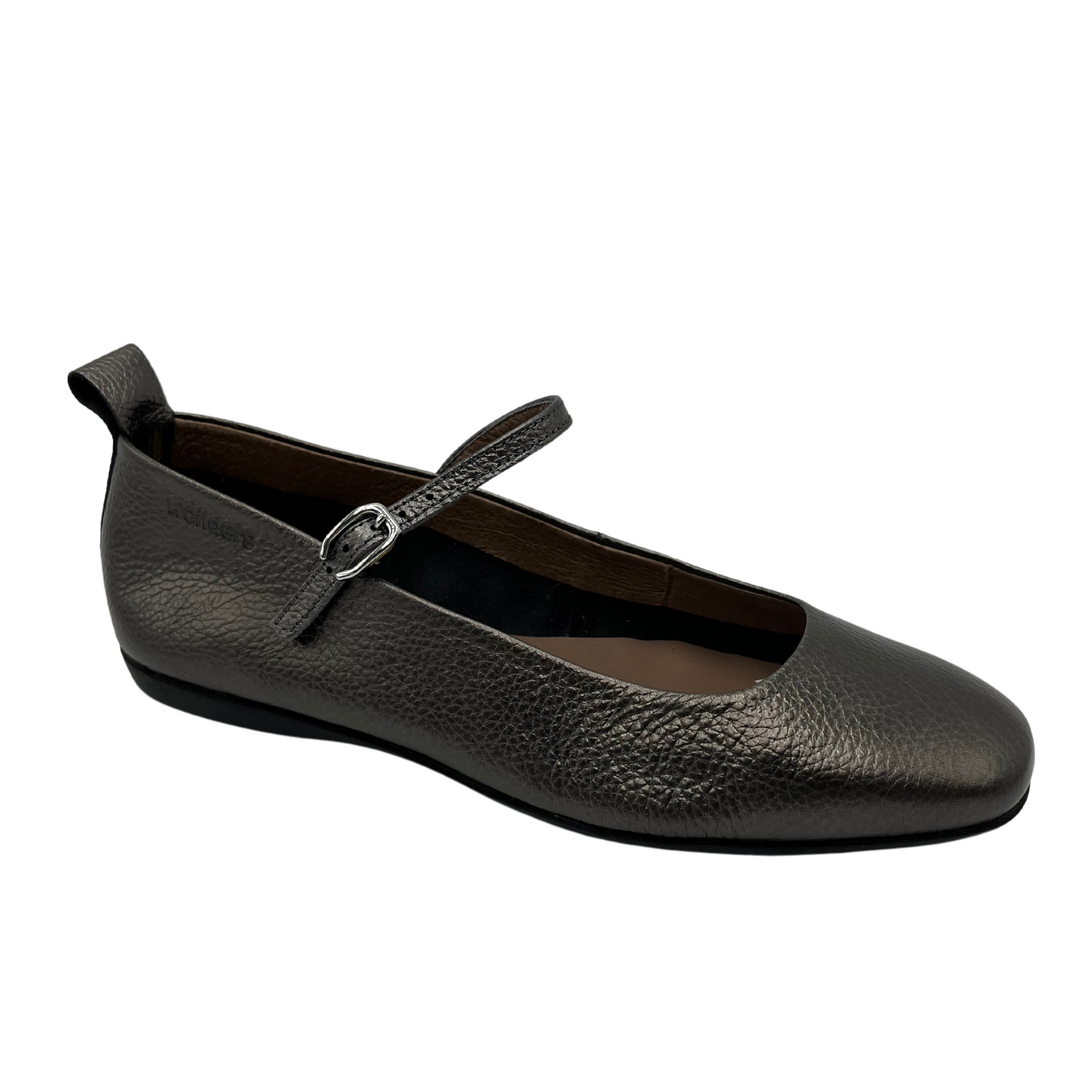 45 degree angled view of textured leather ballet flat with a rounded square toe, pull on tab and small strap with a silver buckle