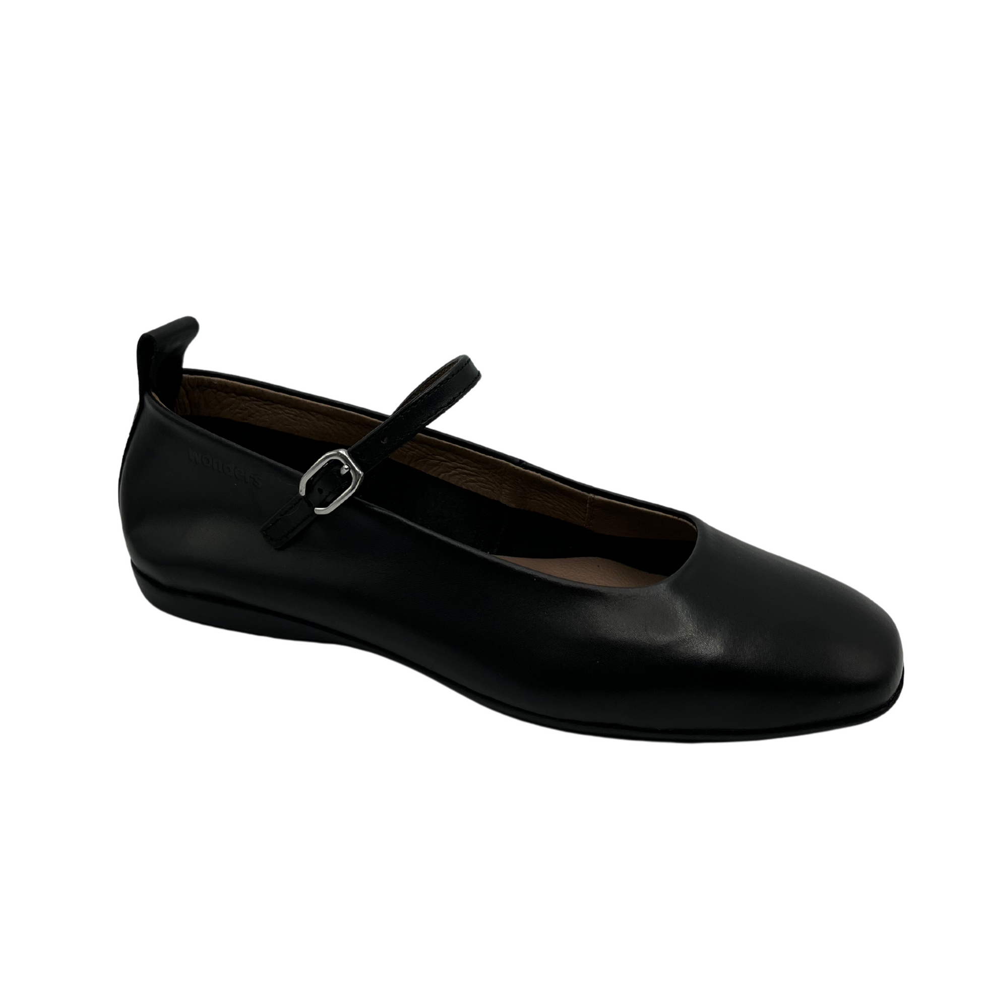 45 degree angled view of black ballet flat with rounded square toe and tiny strap with silver buckle