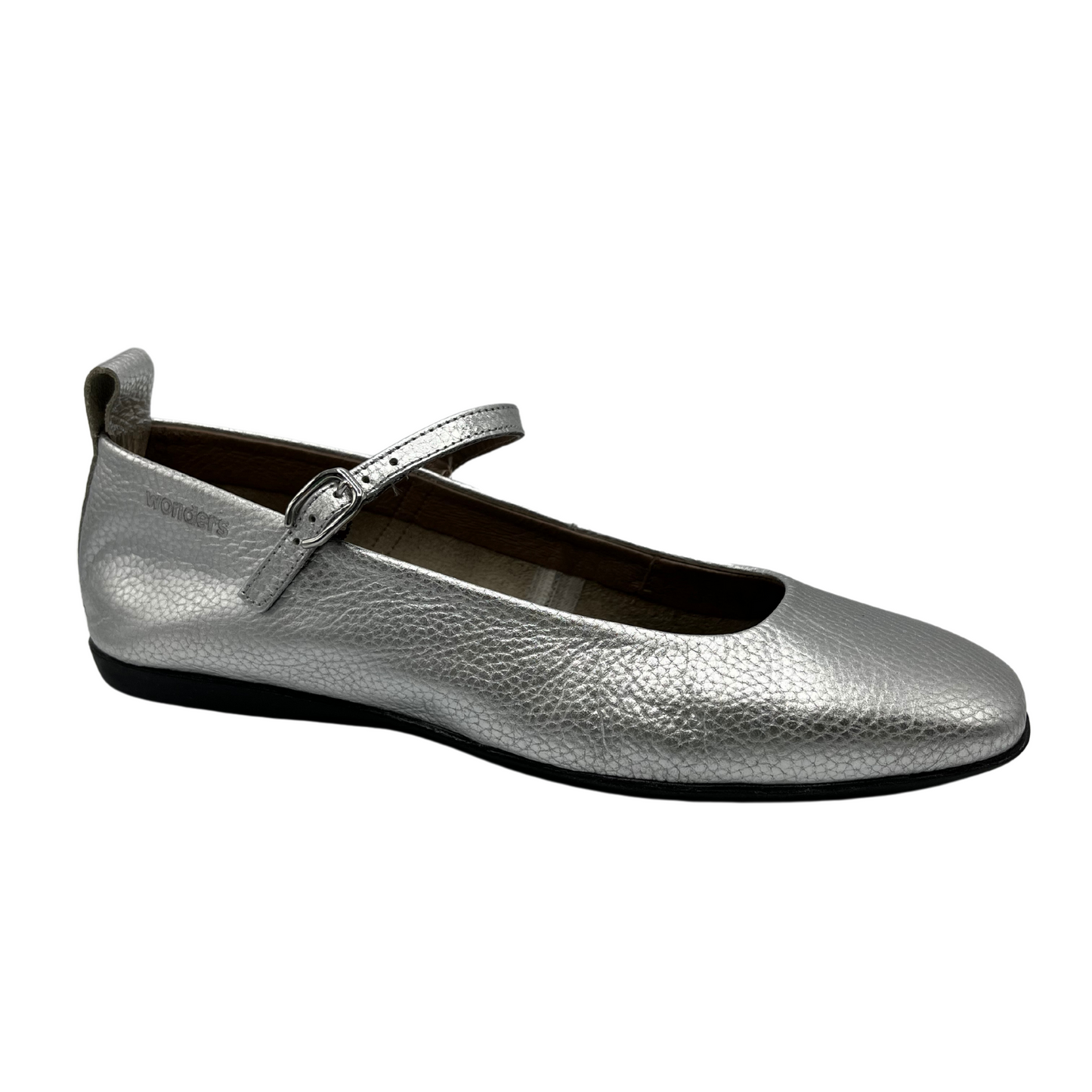 45 degree angled view of metallic silver leather ballet flat with pull on tab and small strap with silver buckle