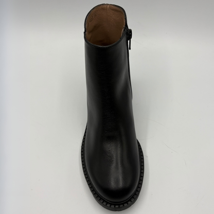 A black leather ankle boot with a side zipper, shown from a top-down perspective on a light gray background.