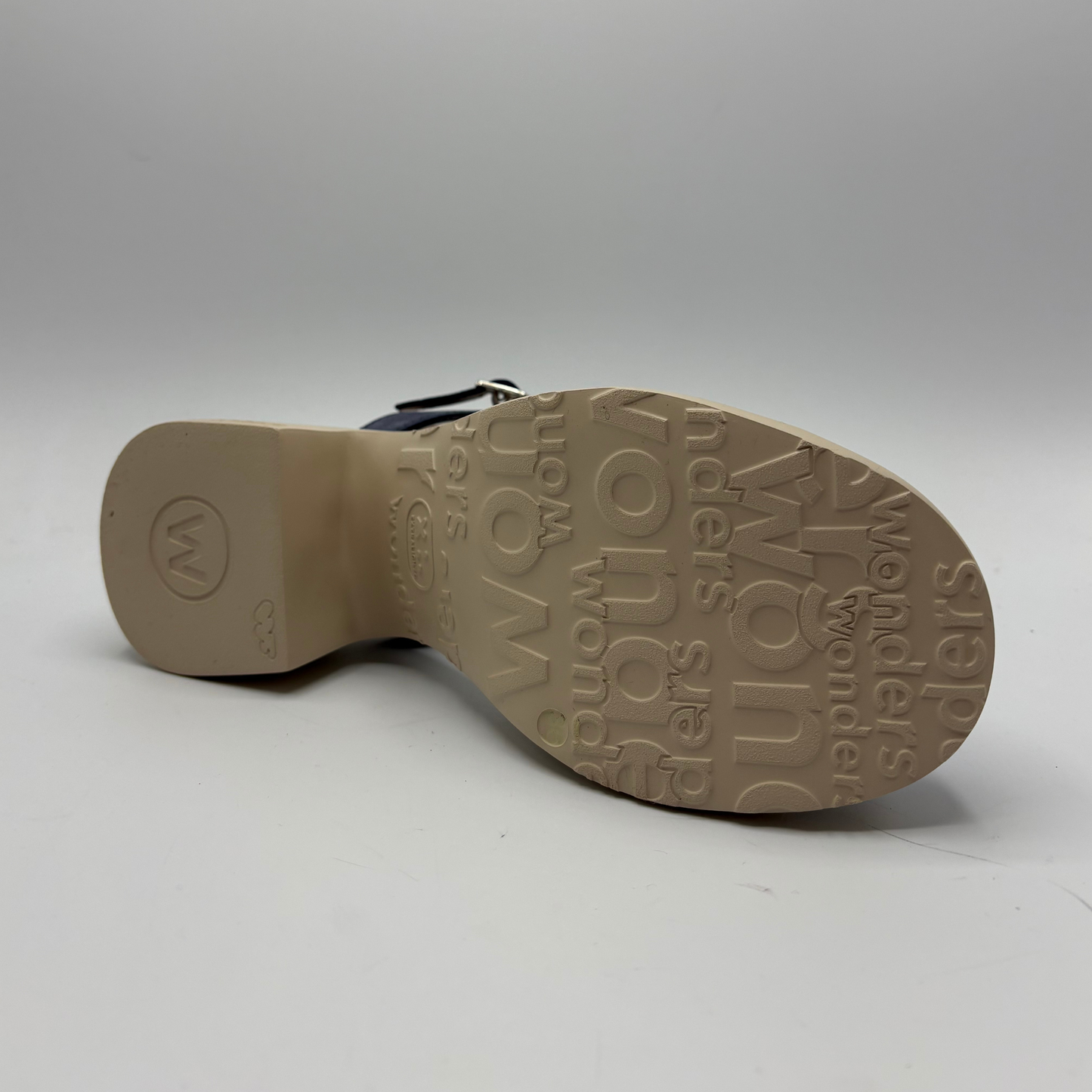 Wonders brand shoe sole on a gray background