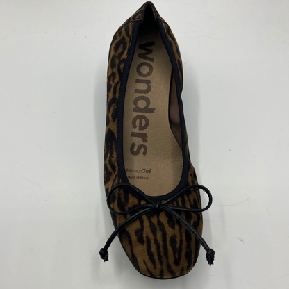 Leopard print flat shoe with 'wonders' branding on a white background