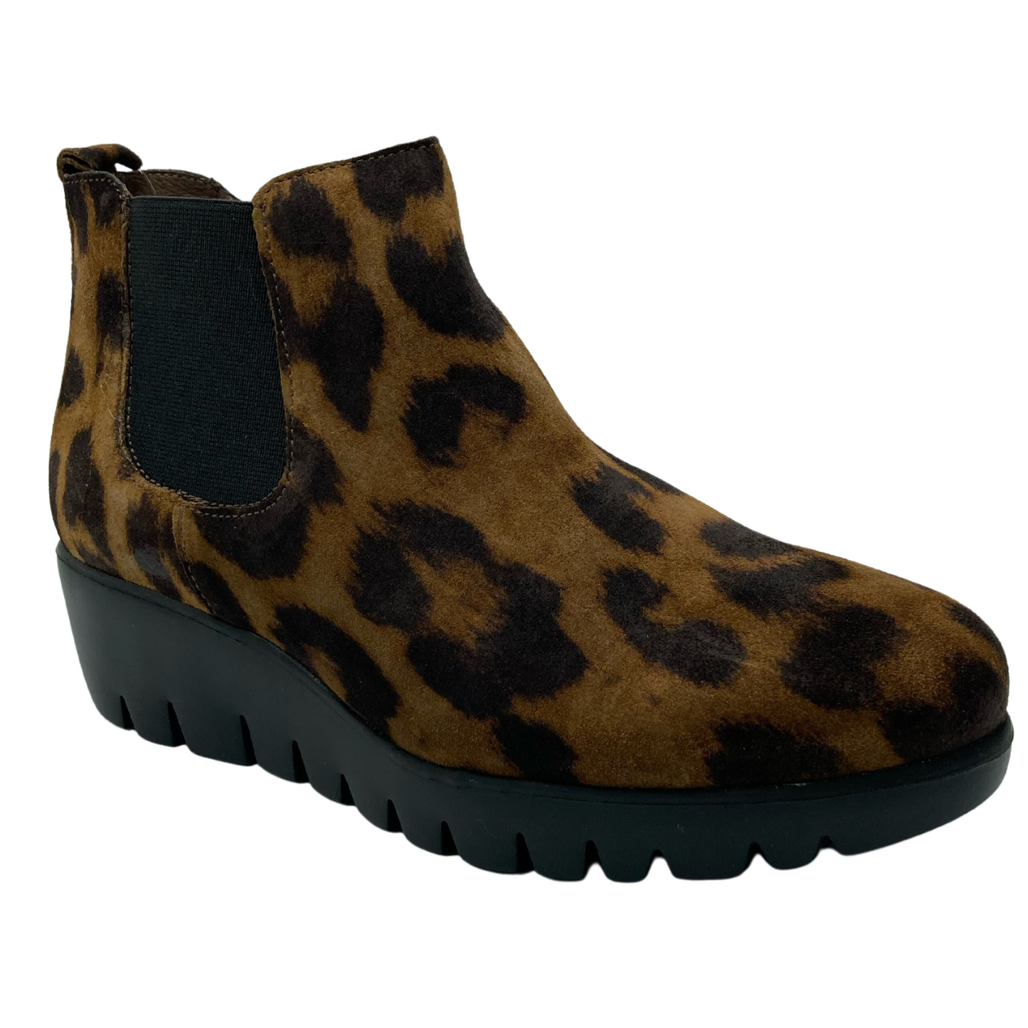 45 degree angled view of suede leopard print ankle boot with black rubber outsole and elastic side gore