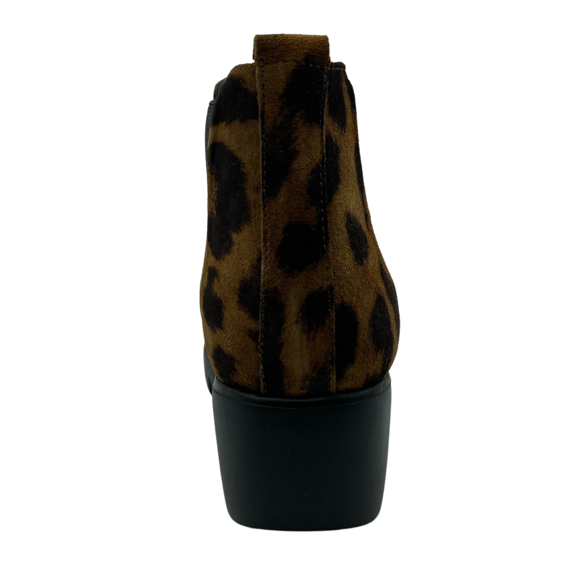Back view of leopard suede short boot with black rubber wedge heel