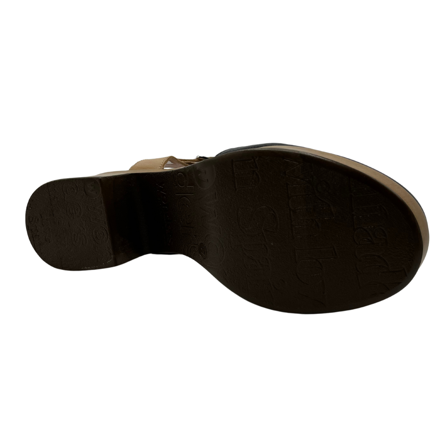Bottom view of black and tan clog with chunky sole and rounded toe