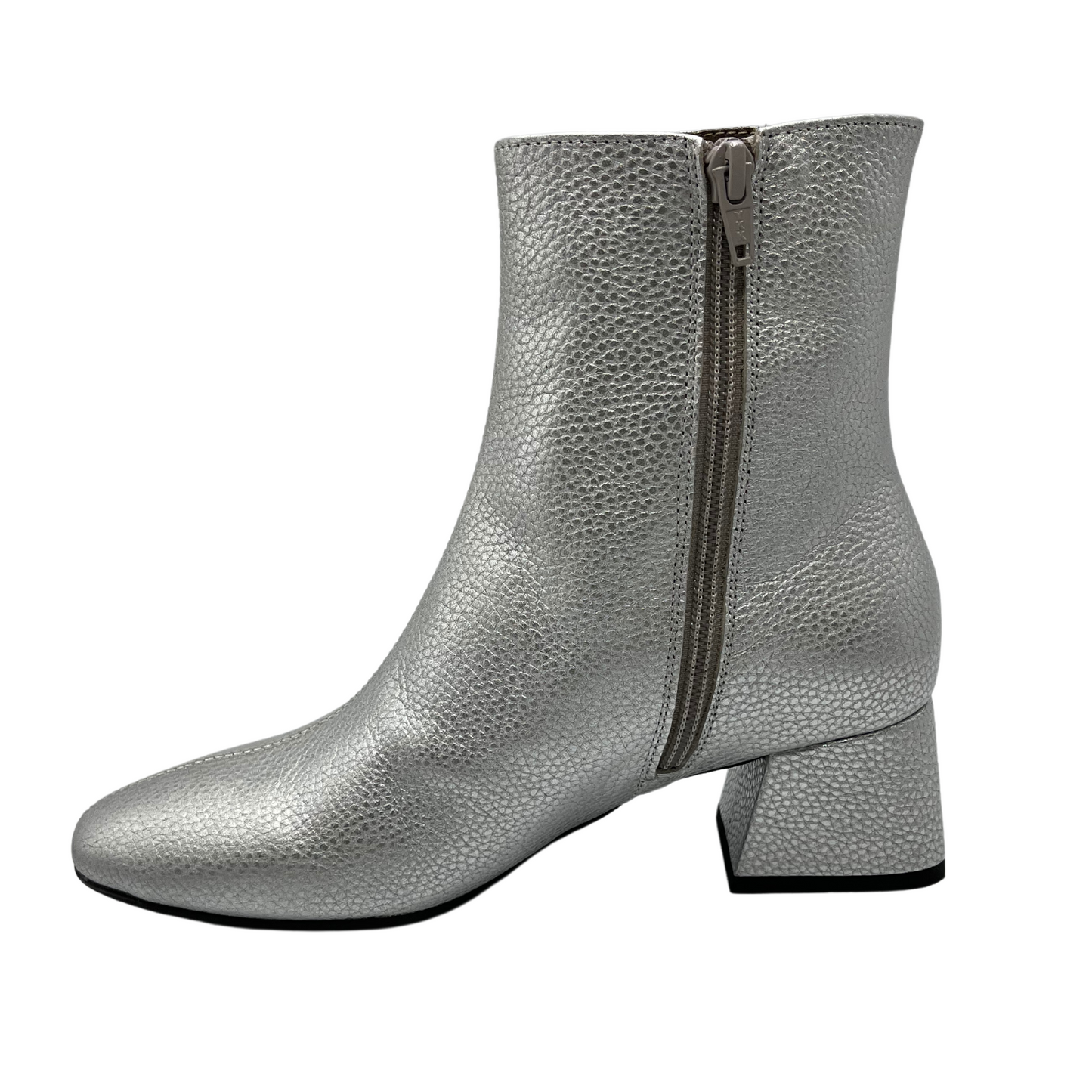 Left facing view of silver textured leather short boot. Short block, side zipper closure and rounded toe