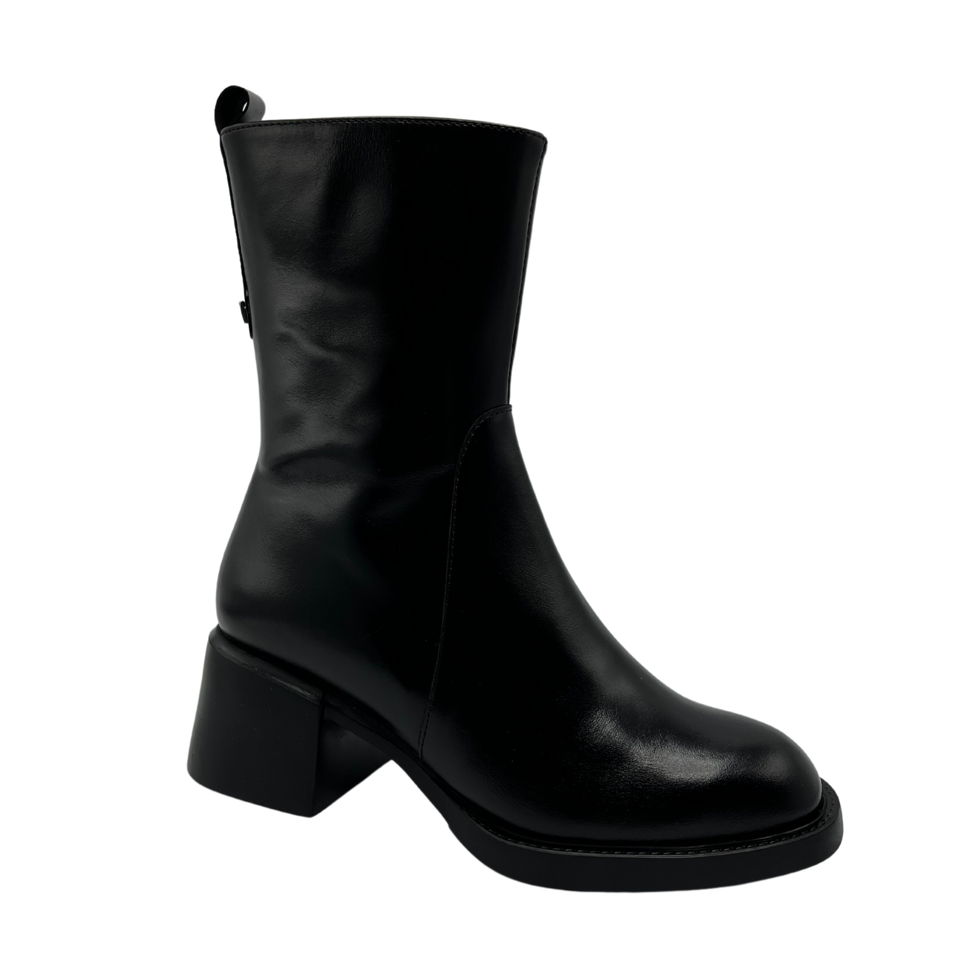 45 degree angled view of black leather short boot with chunky heel and pull on tab