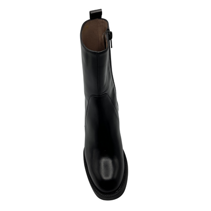 Top view of black leather short boot with chunky heel and pull on tab