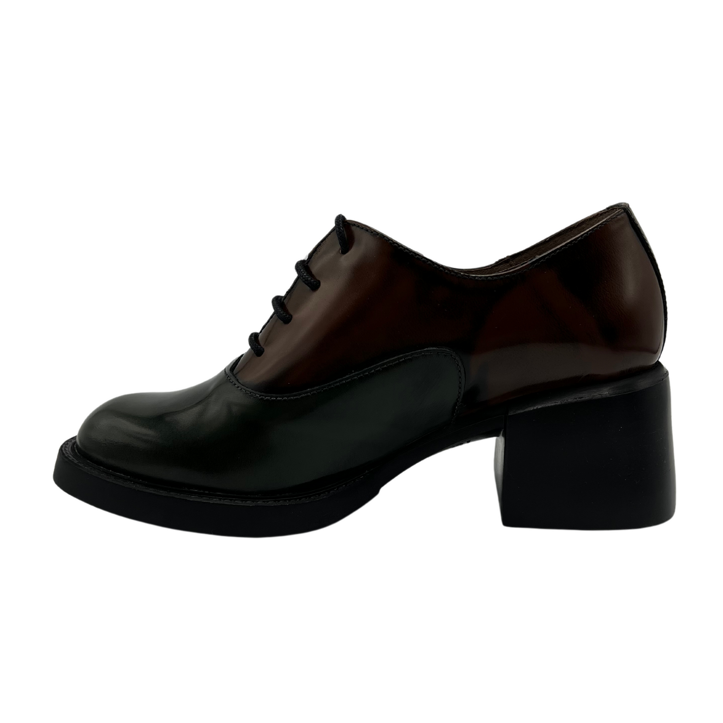 Left facing view of brown and green leather heels. Black outsole with a sturdy block heel