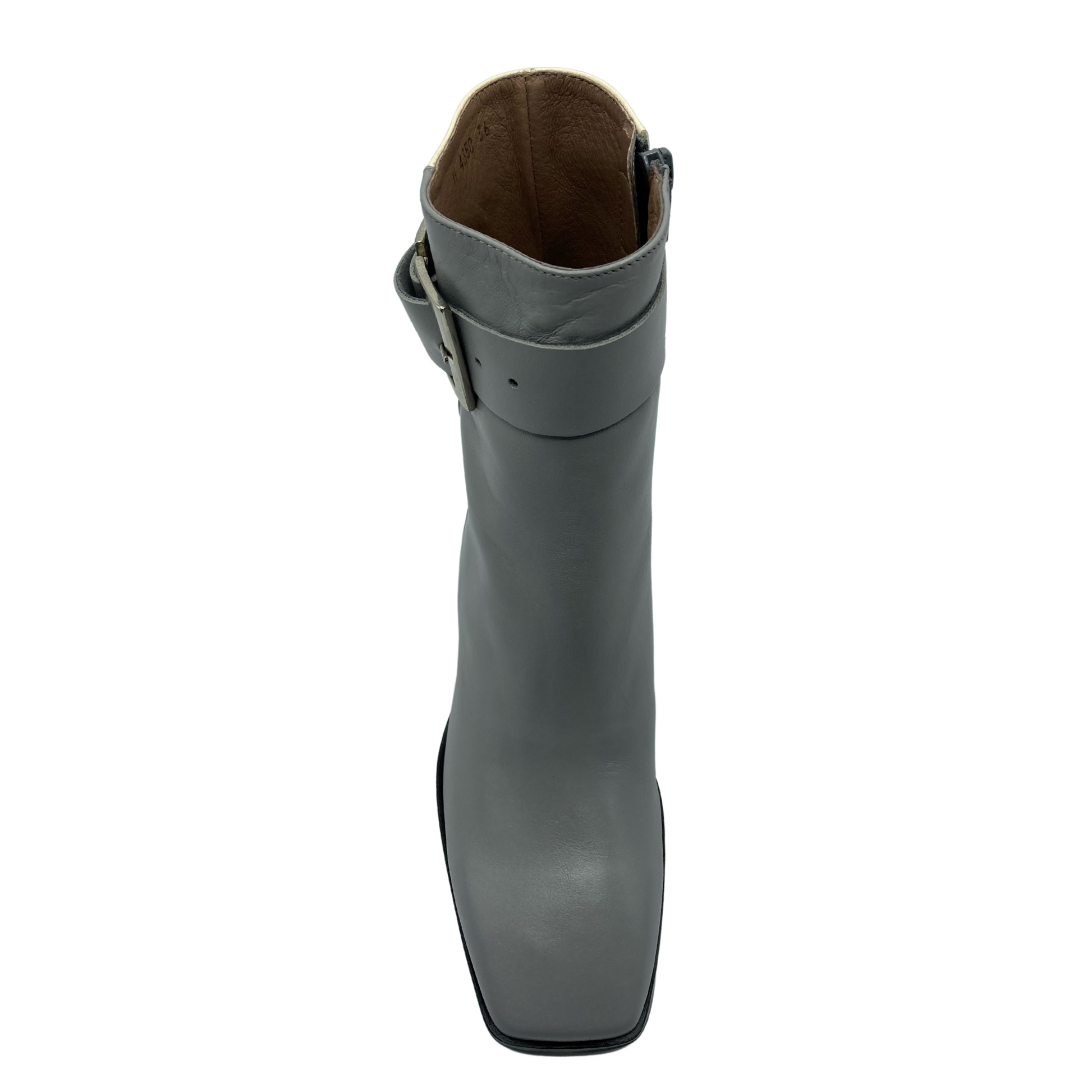 Top down view of grey square toed leather boot