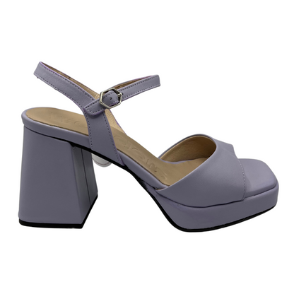 Right facing view of leather lavender sandals with chunky flared heel, thin ankle strap and square toe
