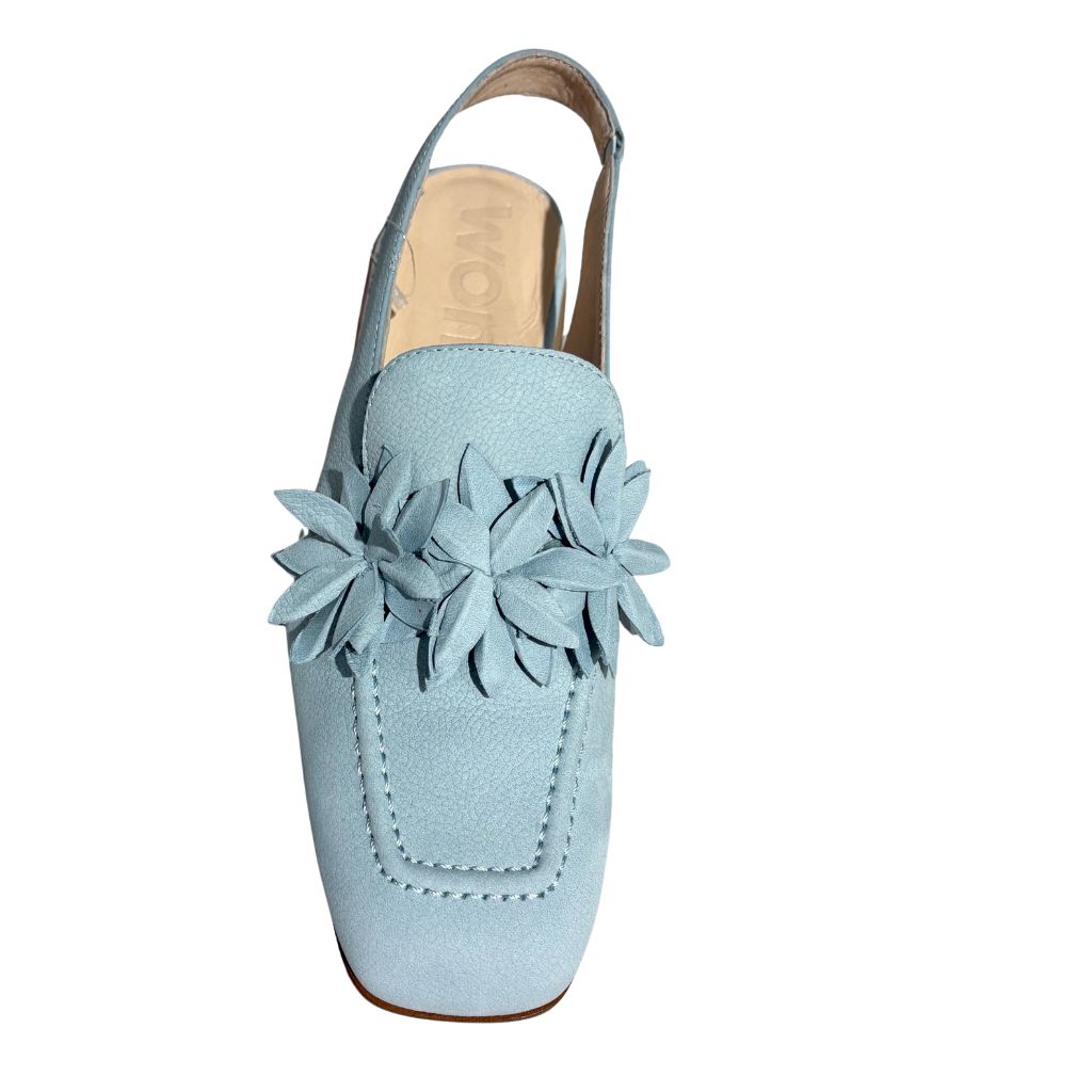 Light blue loafer with floral details on a white background