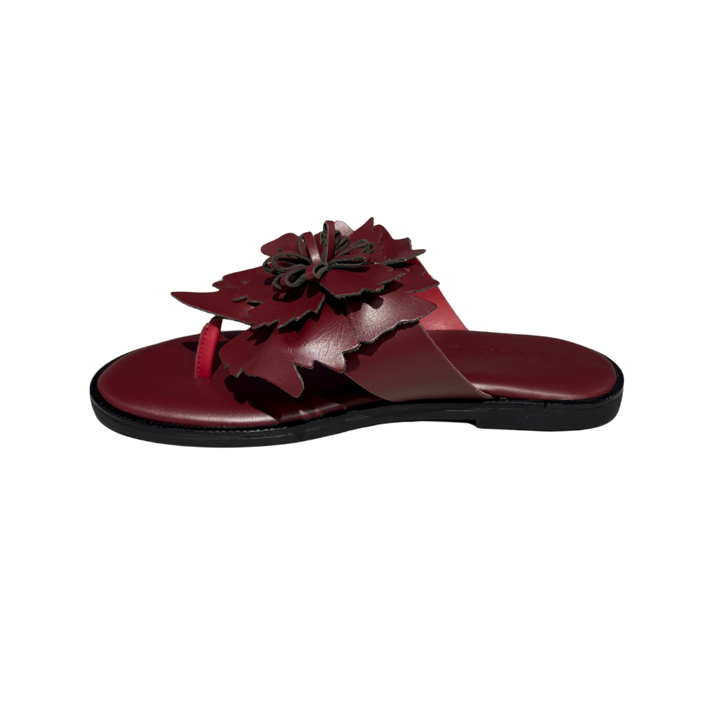Bordo sandal with a flower design on a white background