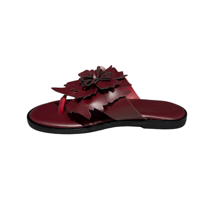 Bordo sandal with a flower design on a white background