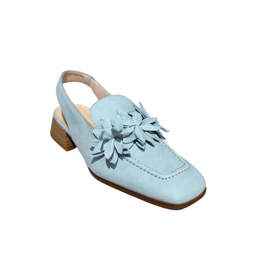 Light blue shoe with a wooden sole on a white background