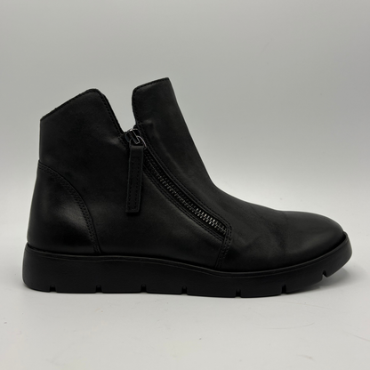 A single black leather ankle boot with a side zipper, shown in profile against a light gray studio background.