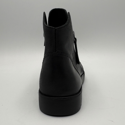 A black leather ankle boot shown from a rear three-quarter view, featuring a thick platform sole and side cutout details, set against a plain light gray background.