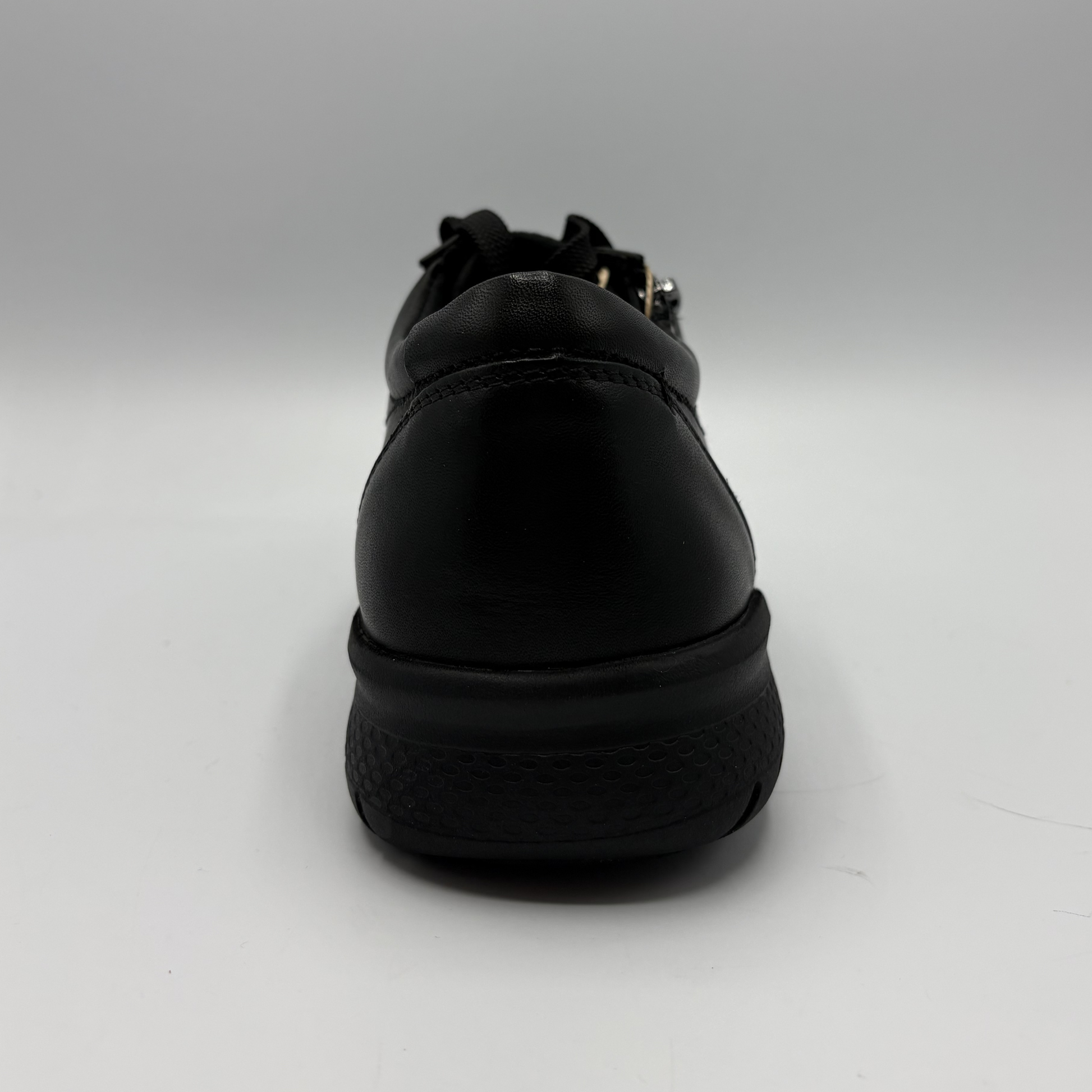 Black shoe on a white background
