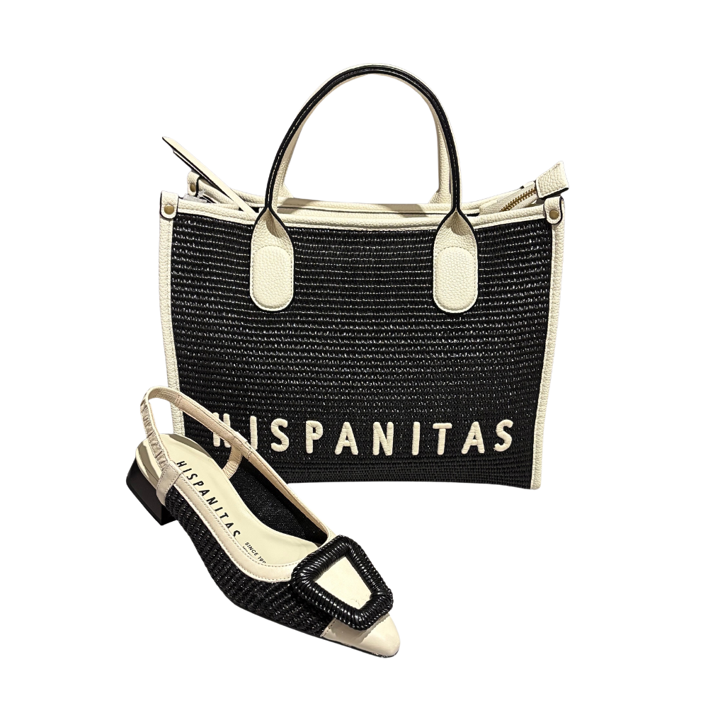 Black handbag with 'HISPANITAS' branding and a matching black shoe on a white background