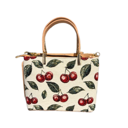Handbag with cherry pattern on a white background