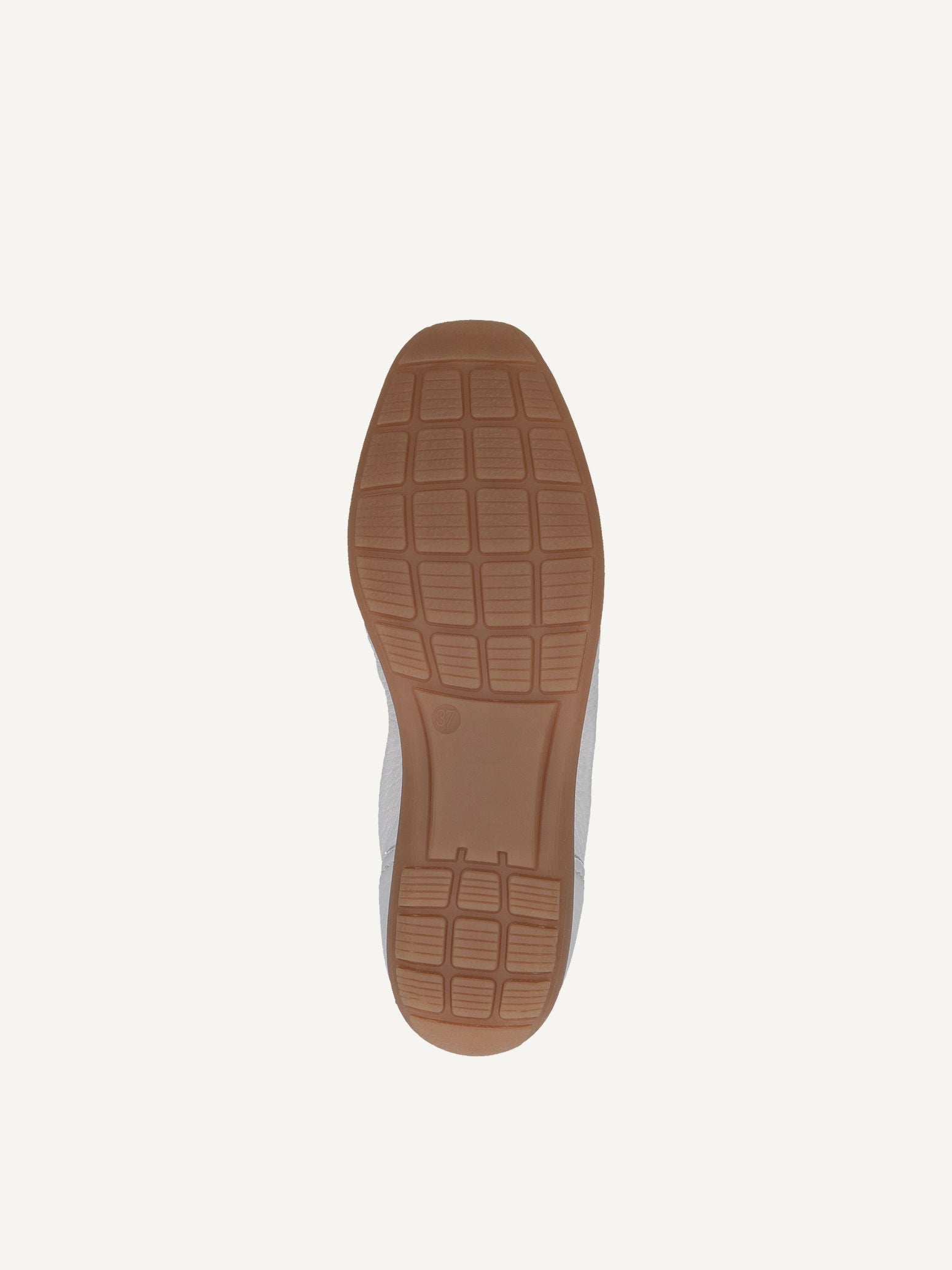 Brown sole of a shoe on a white background