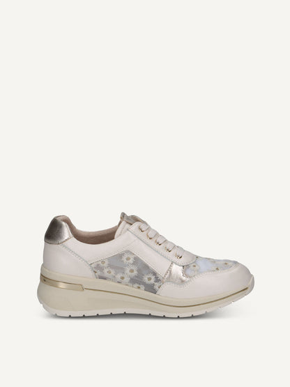 White sneaker with floral pattern on a white background