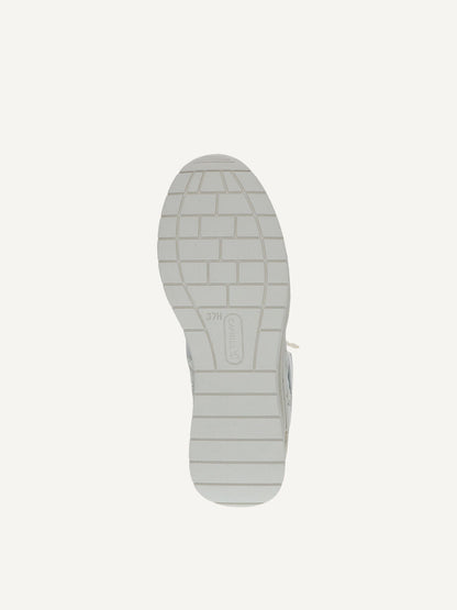 White shoe sole on a light gray background