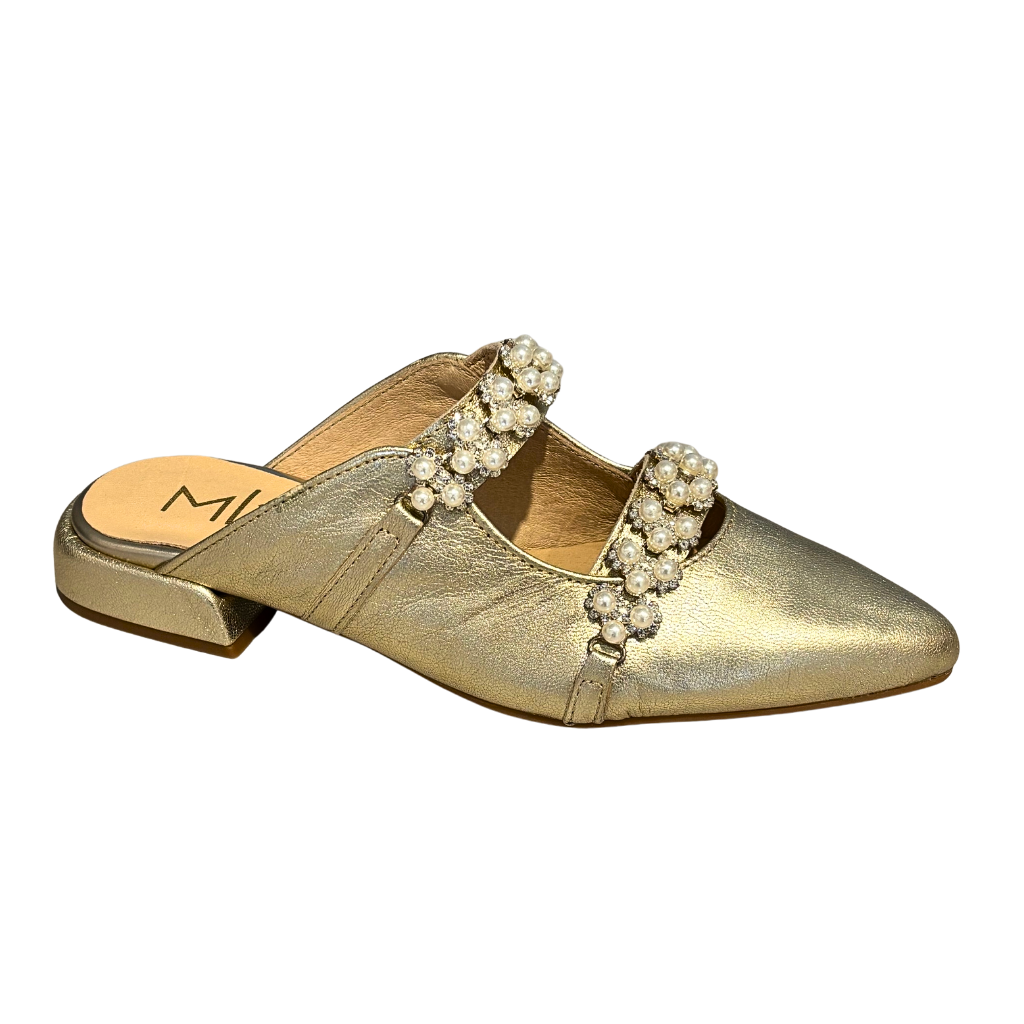 Gold shoe with pearl and crystal embellishments on a white background