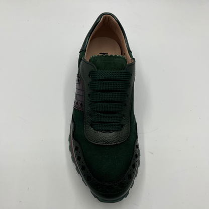 Green sneaker on a white background