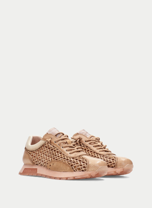 Beige sneakers with a textured pattern on a white background