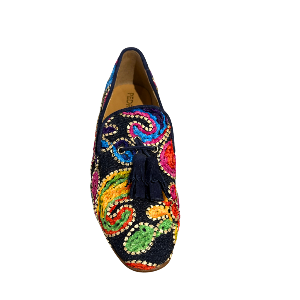Colorful embroidered shoe on a white background