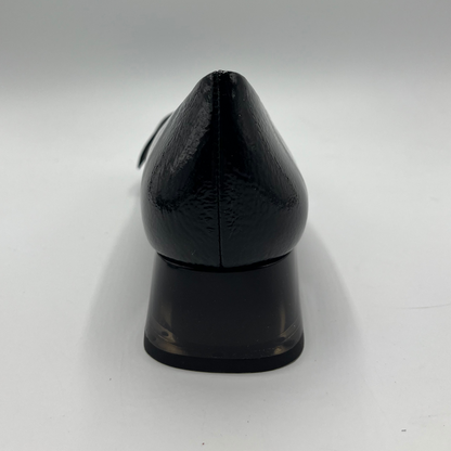 Black high-heeled shoe on a white background