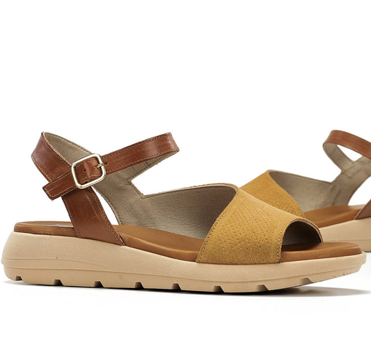 Brown and mustard sandal with a strap on a white background