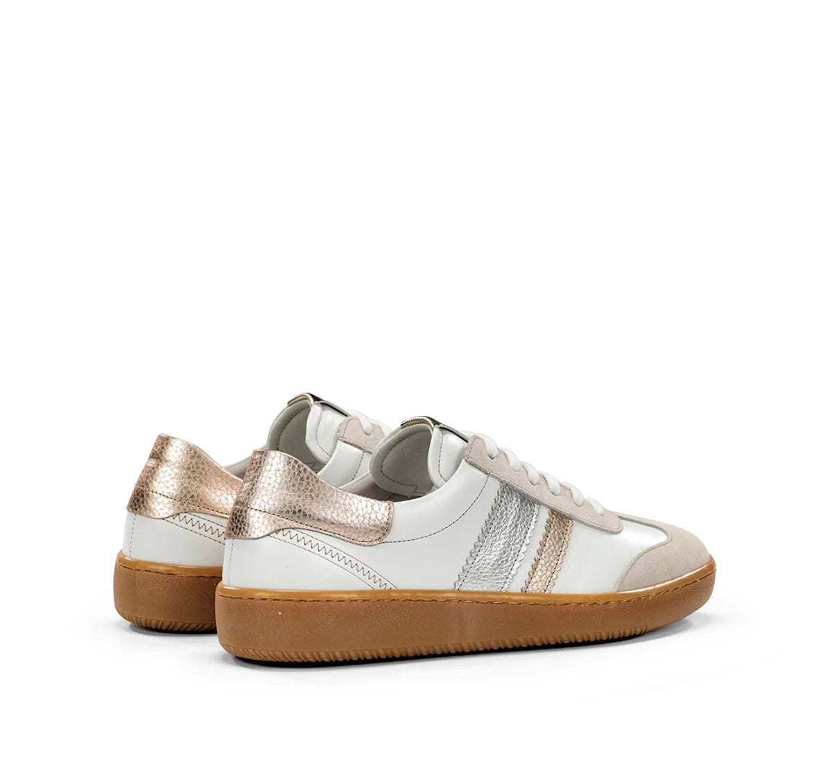 White sneakers with metallic accents on a white background