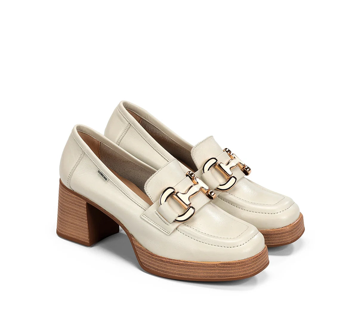 White loafers with gold buckles on a white background