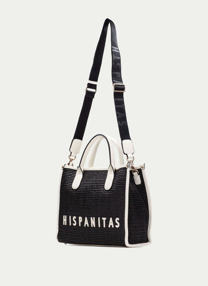 Black handbag with white text 'HISPANITAS' on a light gray background