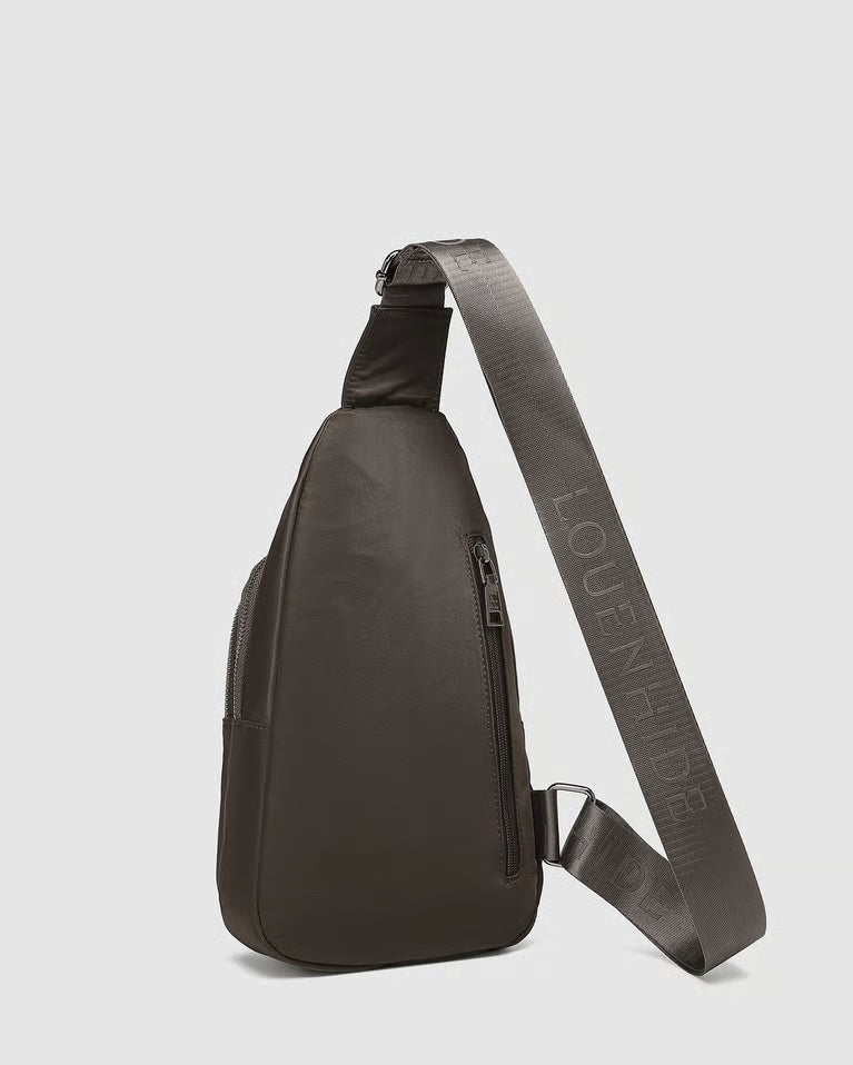 Black sling bag with visible brand logo on a light gray background